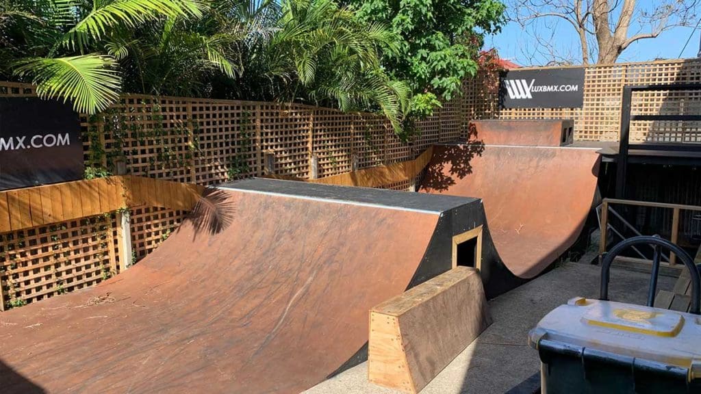 As the tyre marks attest, this ramp located behind the Lux BMX warehouse gets plenty of use during lunch times and other breaks.