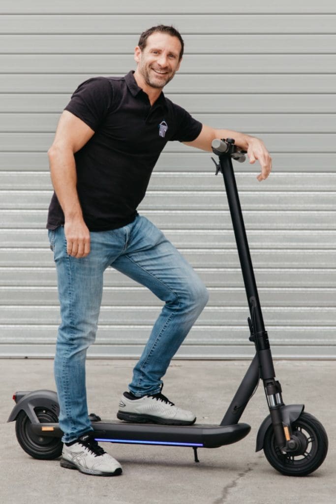 Scott Mackintosh riding the e-scooter boom.
