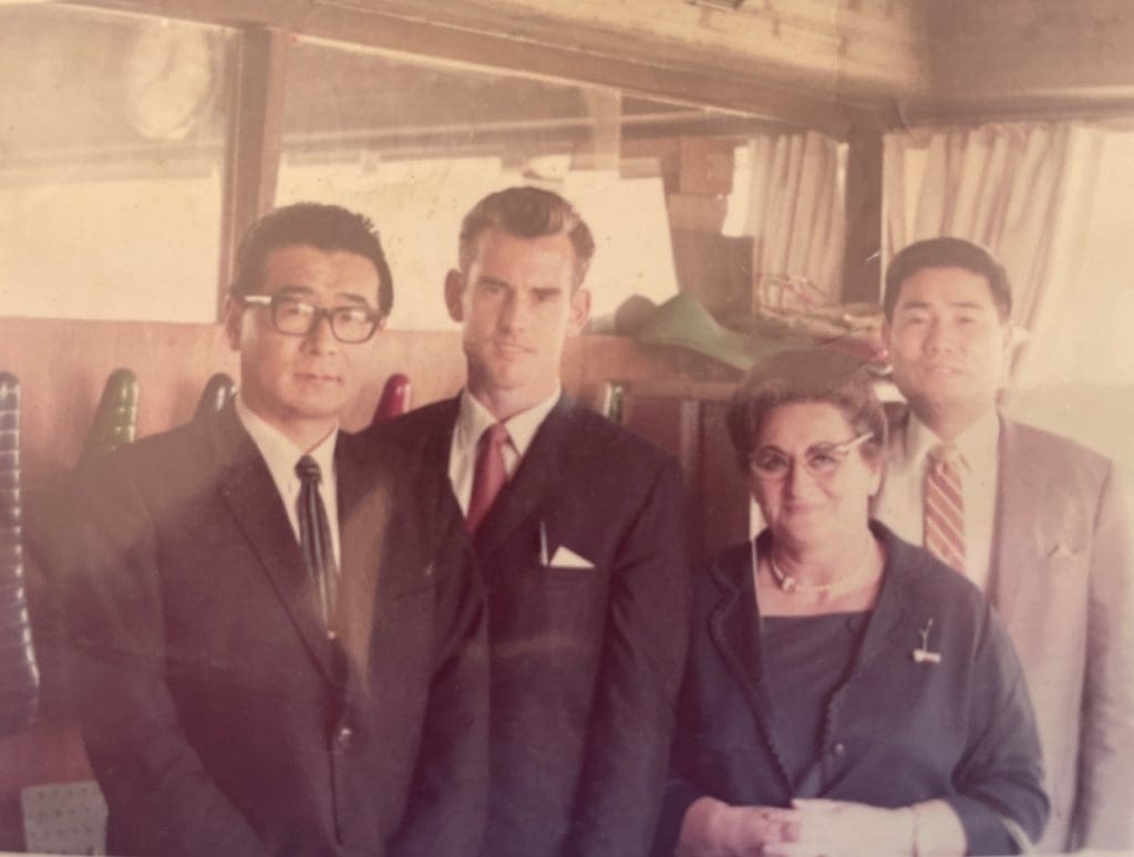 Kevin with Mrs Guerry of Atom Imports, with some unidentified product manufacturers during a buying trip to Japan in 1967.