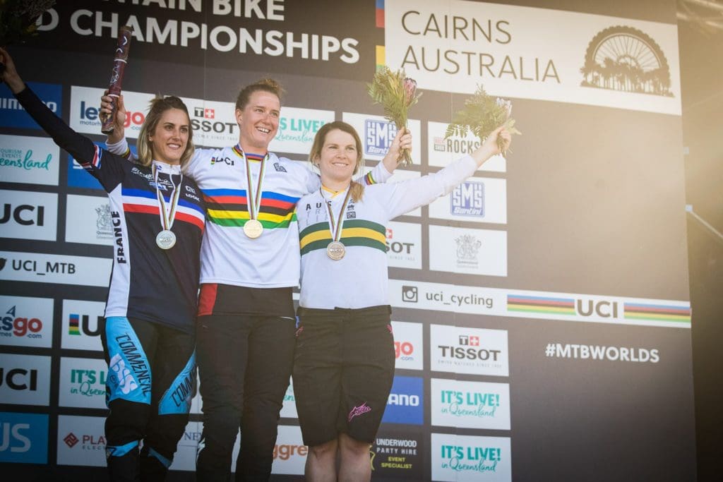 Miranda Miller (centre) helped scoop double gold for the Formula CURA brake at the World Downhill Championships in Cairns in 2017