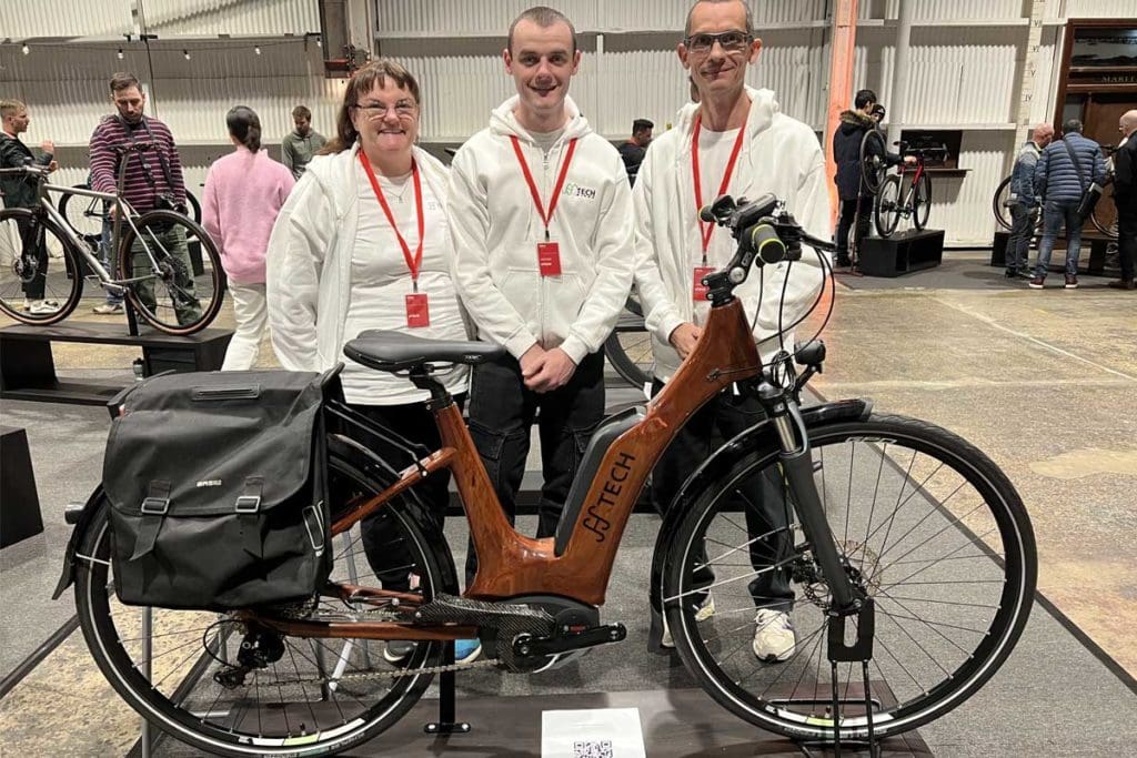 Hayden Francis and Parents with his HTech handmade wooden bicycle frames