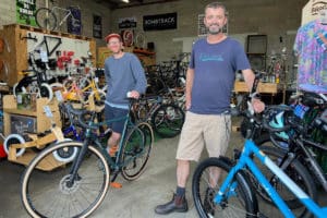 two men standing in Treadly Bike Shop