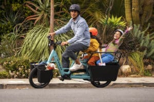 Family riding on Trek e-bike
