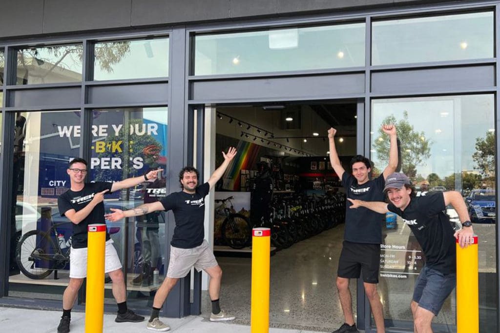 Retail team standing at the front of Trek store
