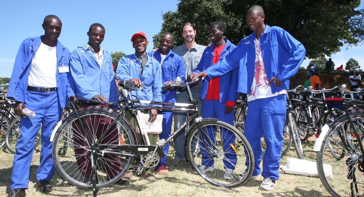 World Bicycle Relief doesn’t just donate bikes and run. They train at least one local field mechanic for each 50 bikes distributed, giving them mechanical training, a tool kit and training in how to run their own micro-business repairing bicycles for a small fee. This is a win-win solution of growing local employment and ensuring the bikes are maintained for longer service. WBR founder FK Day is pictured with new graduate mechanics.