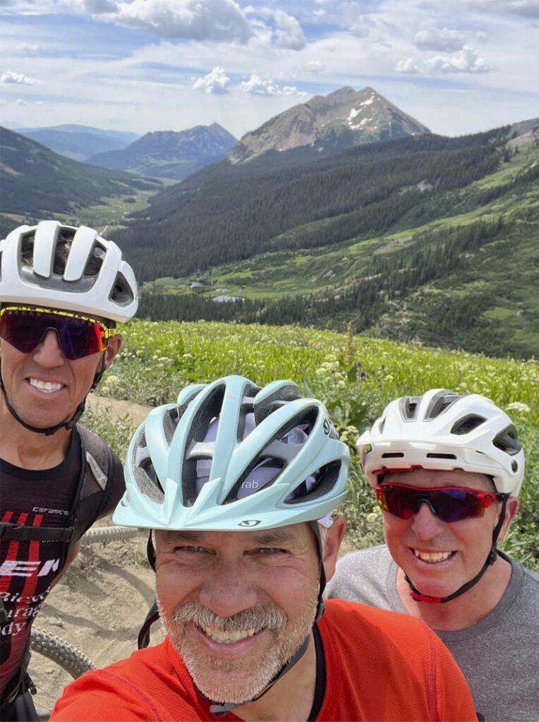 Cyclists with mountain background