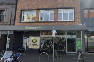 Street view of bicycle store.