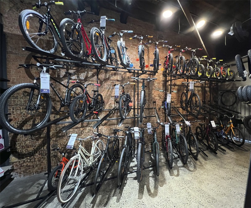 Wall of kid's bikes on display in bike shop