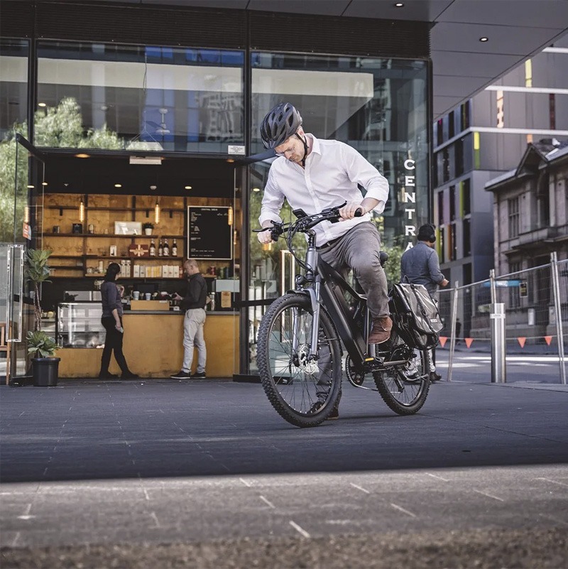 Man riding e-bike in the city