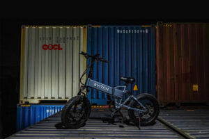 E-bike standing in front of a shipping container