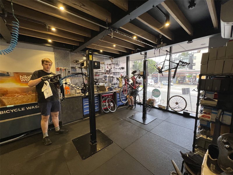 Interior view of bicycle shop, mechanics workshop area