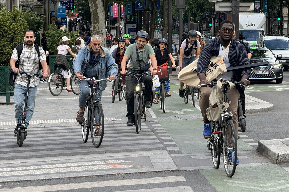 People cycling on a Paris street