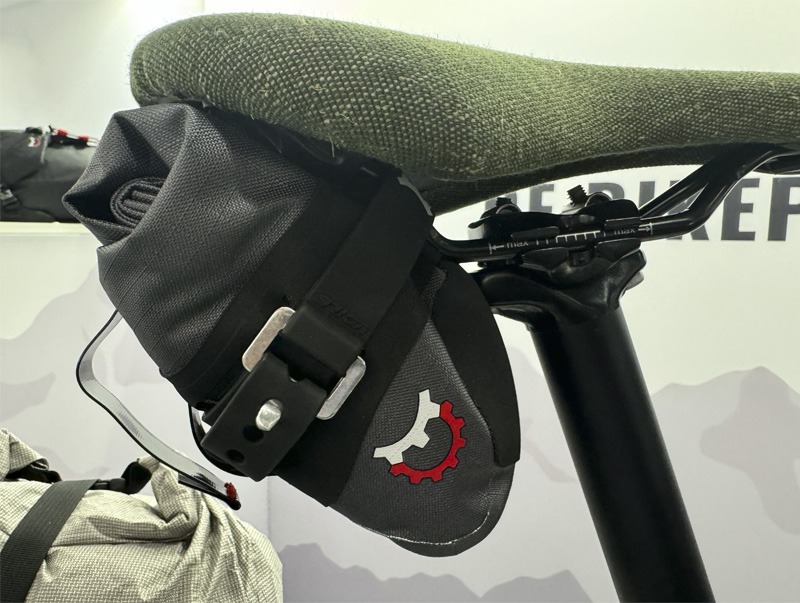 Close up of bicycle seat with under bag attachment