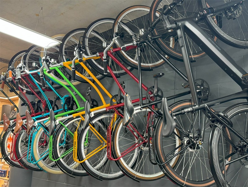 Row of bicycles hanging on wall