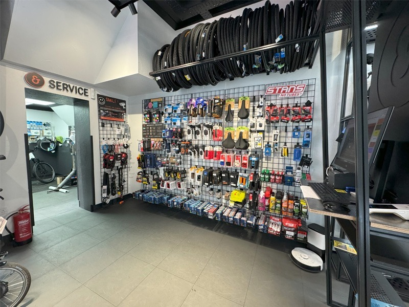 Products displayed on wall of bicycle shop.