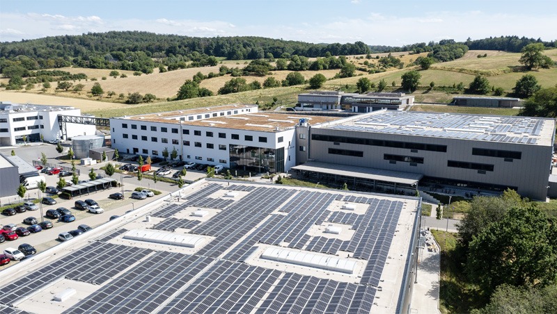 Above exterior view of factory buildings.