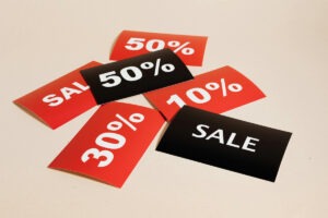 Sale signs in a pile