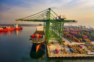 Above view of a port with a ship and shipping containers