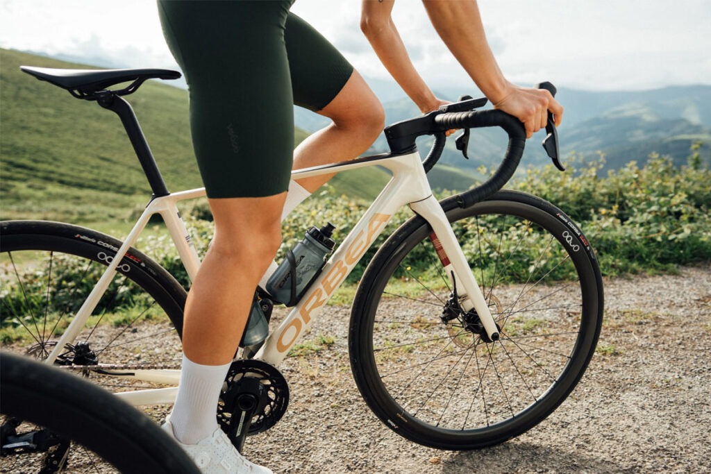 Person riding a bike in the outdoors.