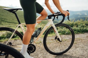 Person riding a bike in the outdoors.