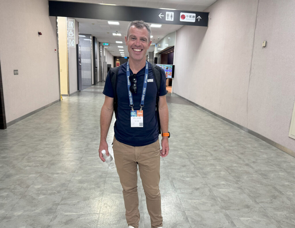 Man with expo badge