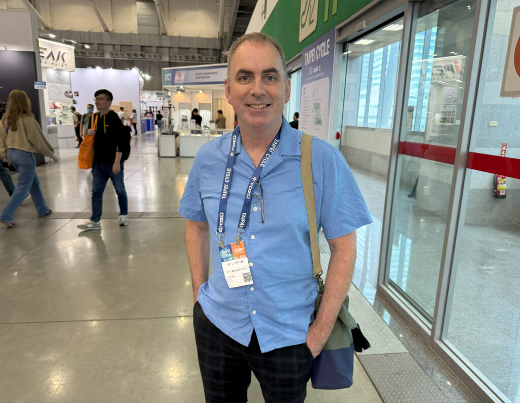 Man with expo badge