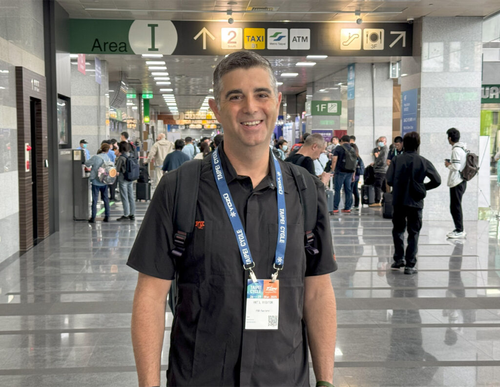 Man with expo badge